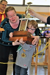 Lawson with Pinewood Derby Trophy